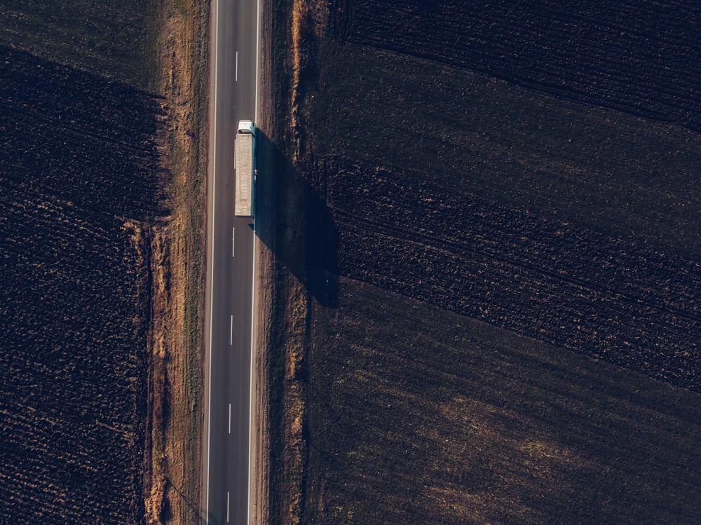 Truck-Hauler-Driving-Down-Road-Above-View-Transportation-2